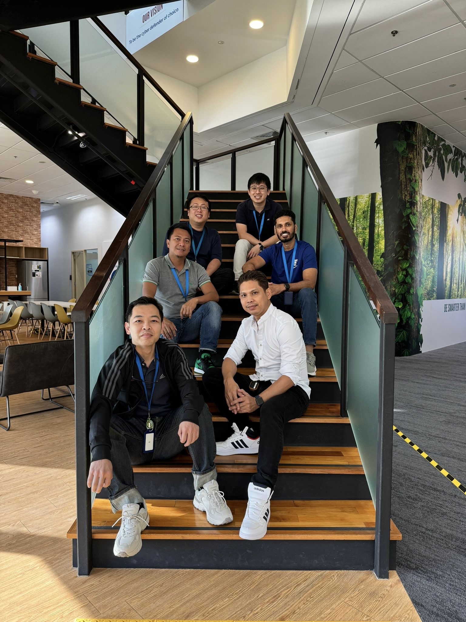 Ensign team photo on staircase